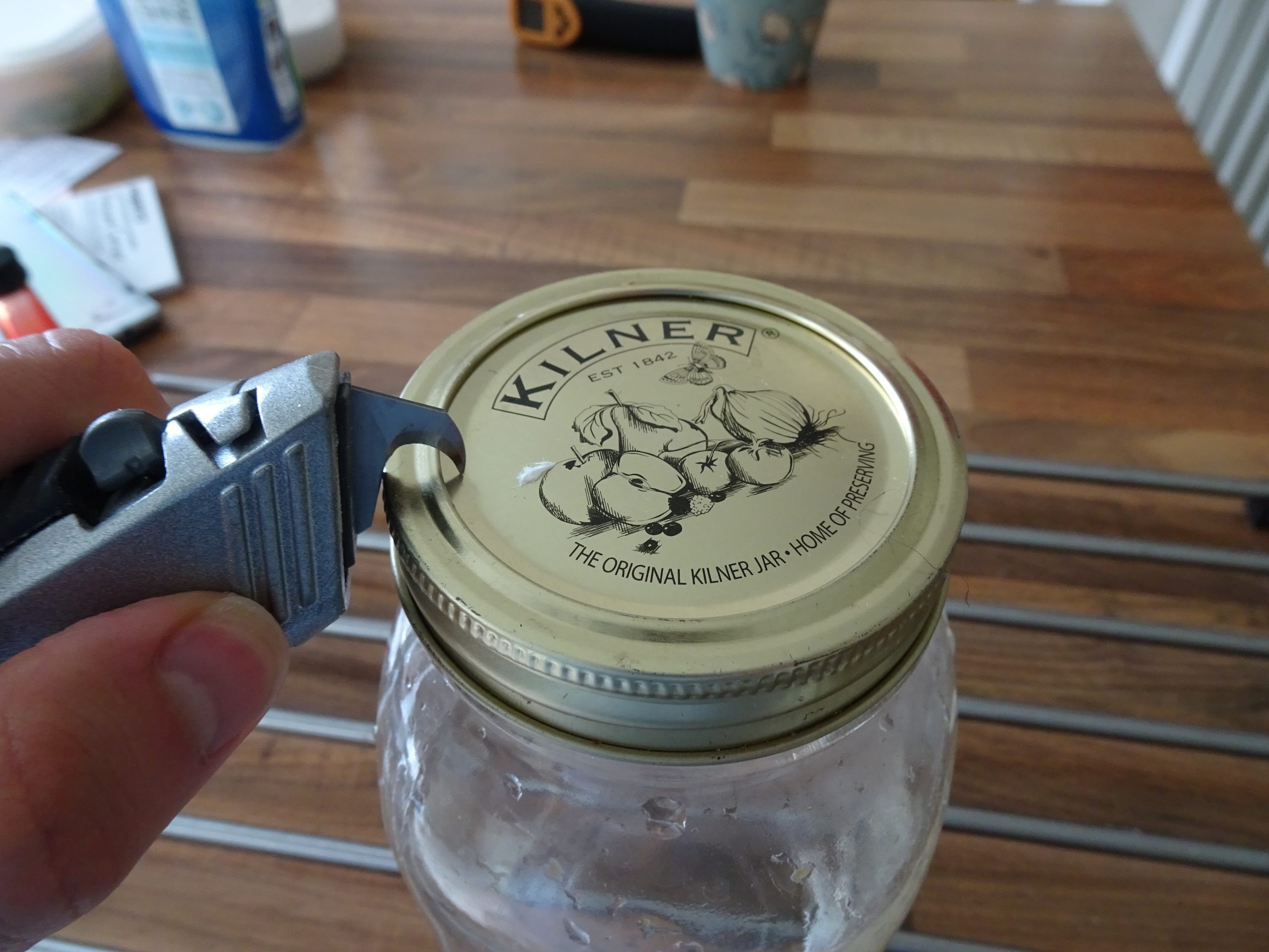 Makng hole in jar lid